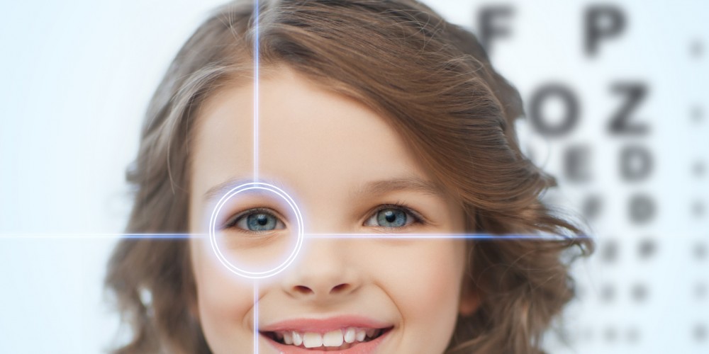 health, vision, medicine, laser correction, happy people concept - smiling pre-teen girl with optometric table or eyesight testing board